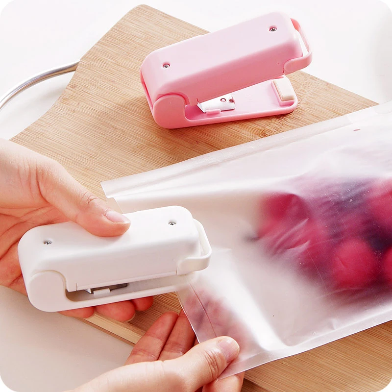 

Portable plastic bag sealer Mini hand electric heating Seal Machine Electric Vacuum Food Sealer