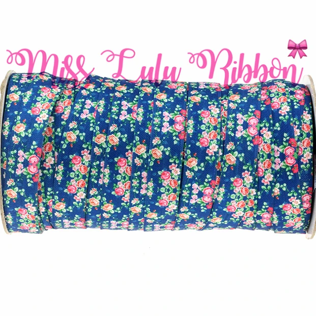 Цветочные узоры темно-синего цвета с принтом отложным голенищем и штаны