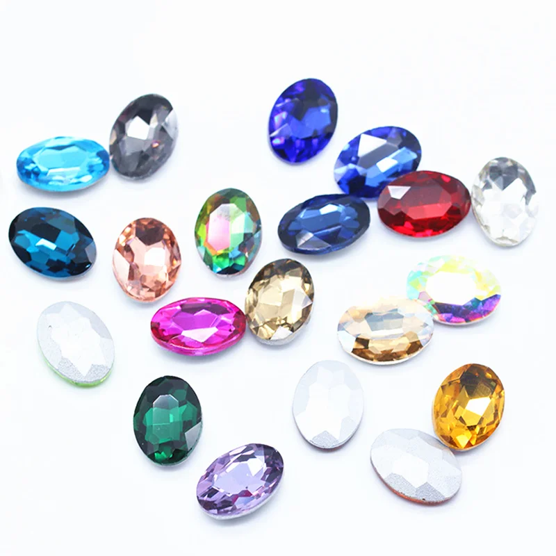 

Factory Sales 50pcs/bag 8*10mm 22 Colors Oval Designs Nail Art Rhinestones 3D Shiny Charm Crystal Gems Jewelry Decorations