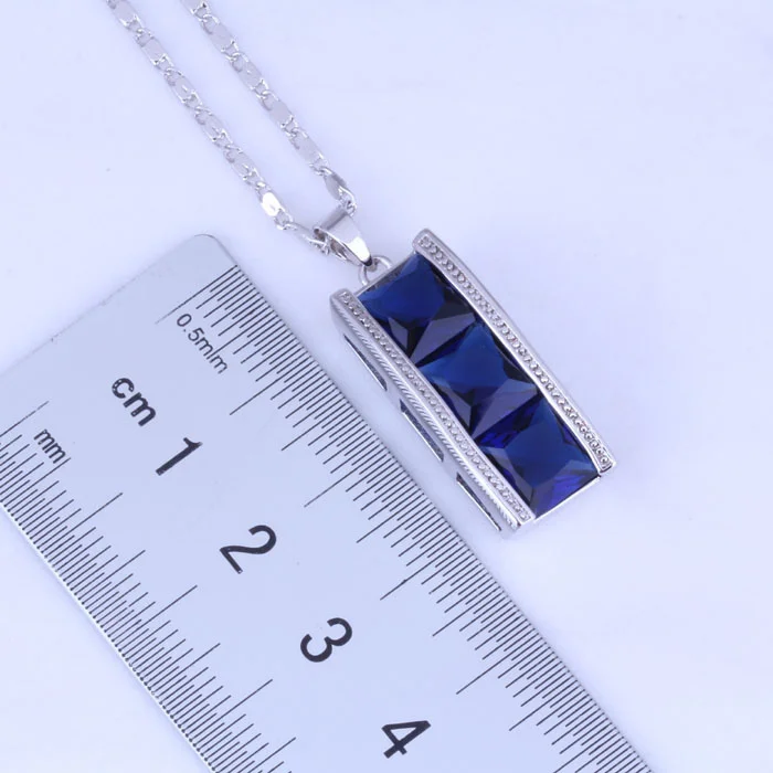 Женский свадебный ювелирный комплект из серебра и синего кристалла модель