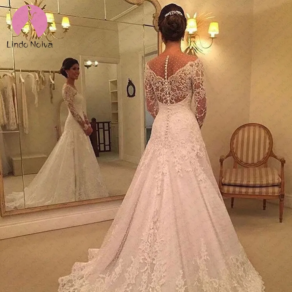 Свадебное платье трапециевидной формы с длинным рукавом и кружевом свадебные