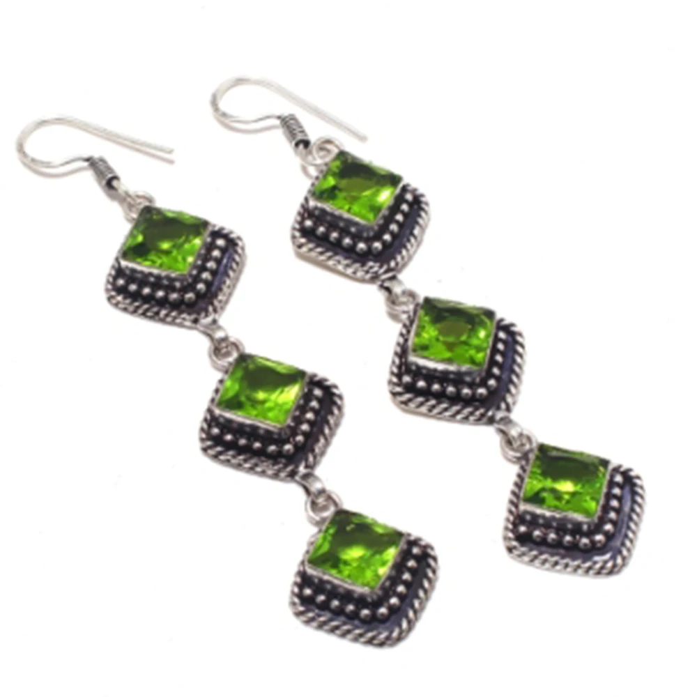 

Peridots,Silver Overlay on Copper Earrings ,88mm , E3910