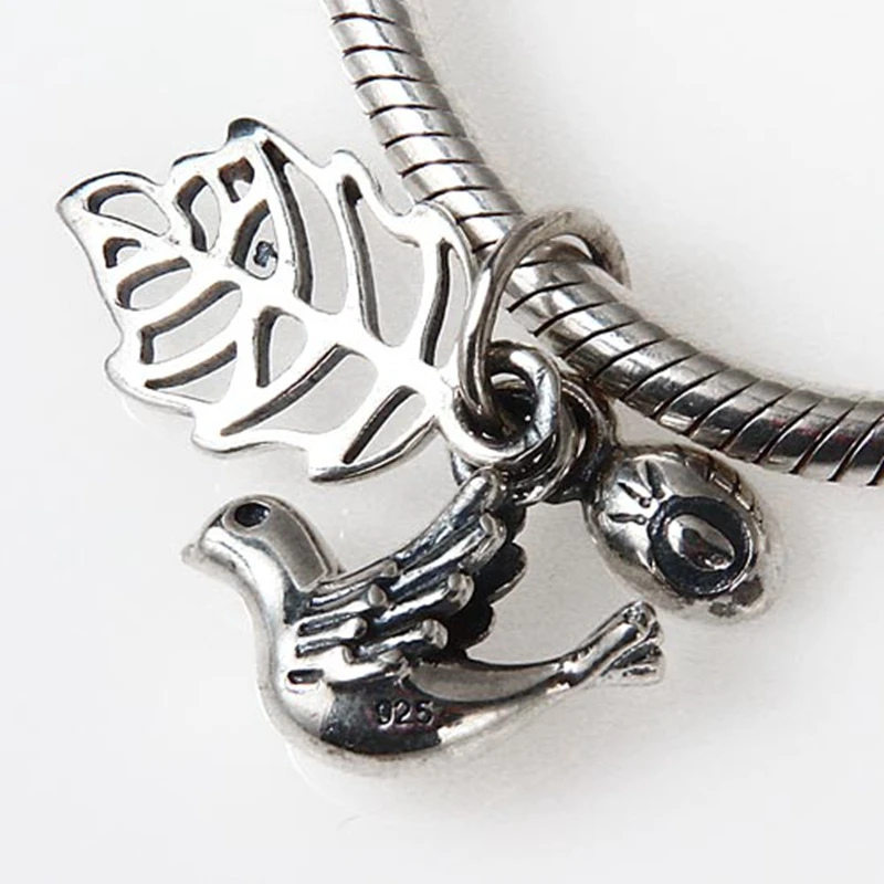 Подвеска-Голубь из серебра 100% пробы с австралийским хрустальным яйцом |