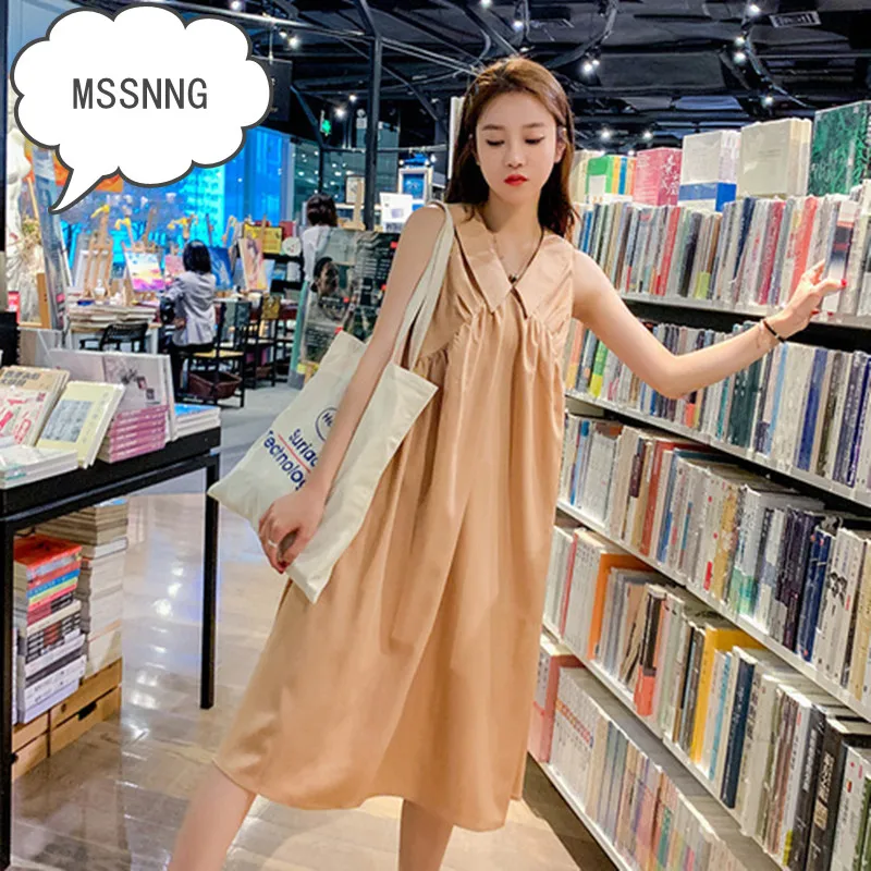 Женское платье без рукавов в стиле ретро с кукольным воротником черное цвета