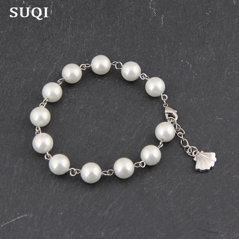 Женский браслет с круглым жемчугом и бусинами