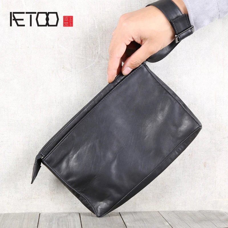 

AETOO Leather retro envelope bag, men's portable storage bag, soft hand bag