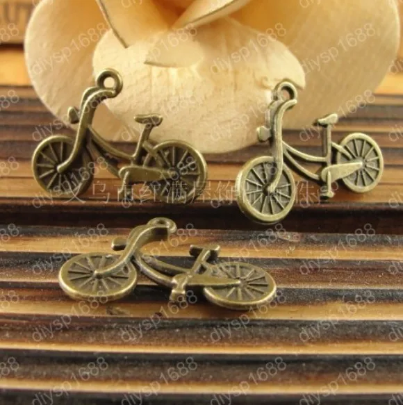 

100 pcs/lot Zinc alloy bead Antique Bronze Plated Charms Pendants Fit Jewelry 25*19MM Double bicycle Shape JJA1023