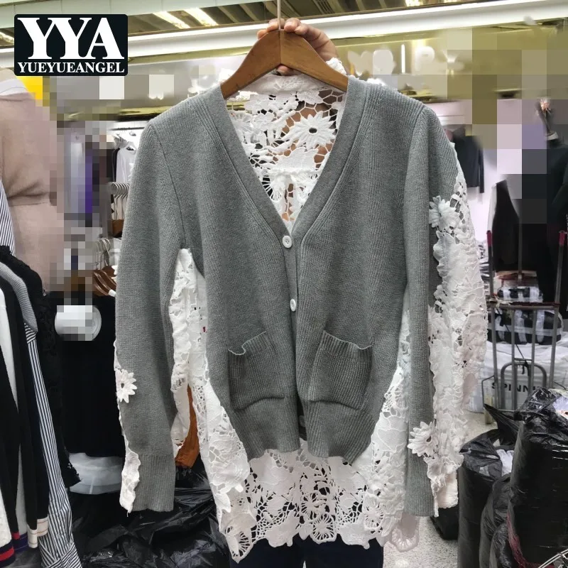 Женский трикотажный свитер серый с длинным рукавом и треугольным вырезом