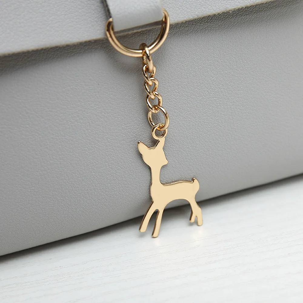 Женская сумка в винтажном стиле с подвеской виде маленького оленя кожаная через