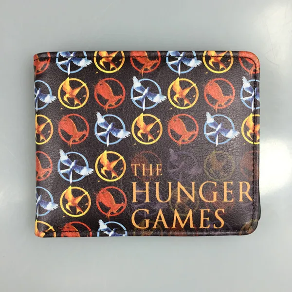The movie hunger games около трех значков разделяющая птица смеется над кошельком Голодные