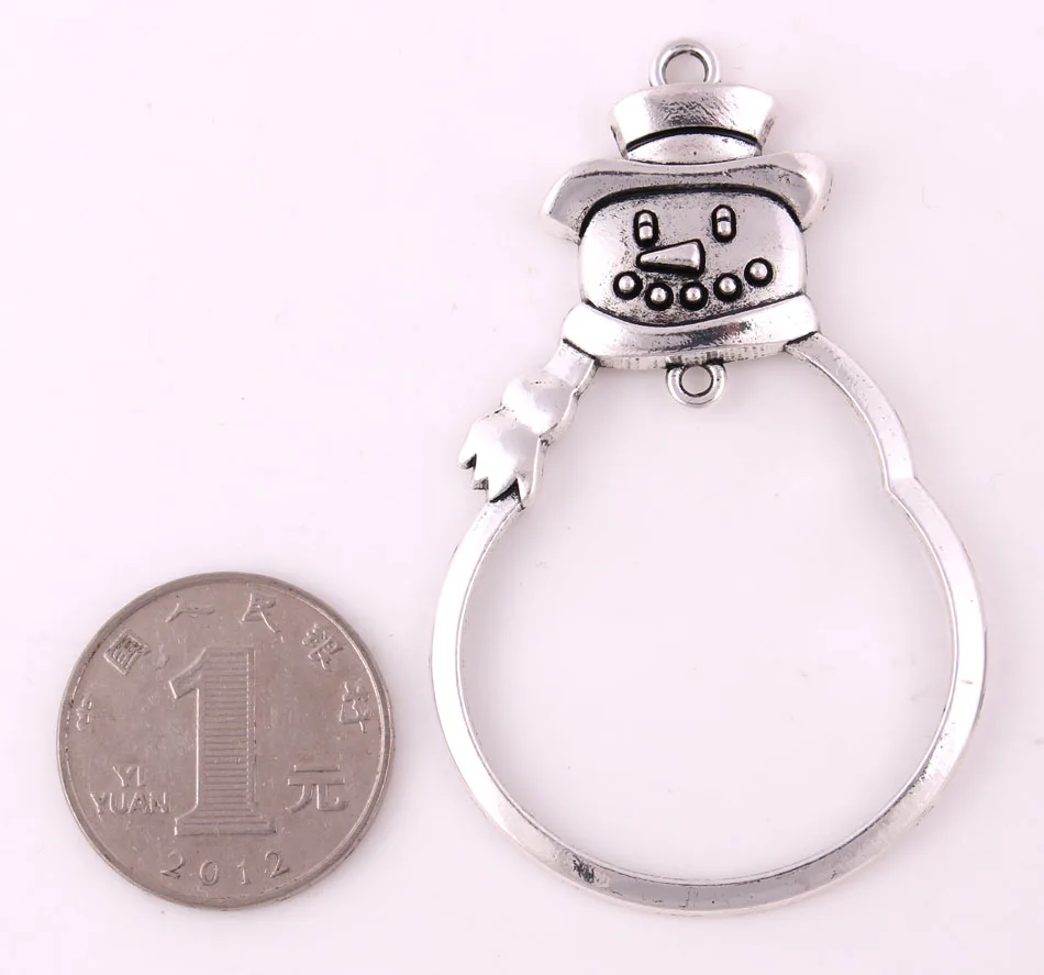 Подвески внутри украшение-подвеска в виде снеговика. Будет заботиться о