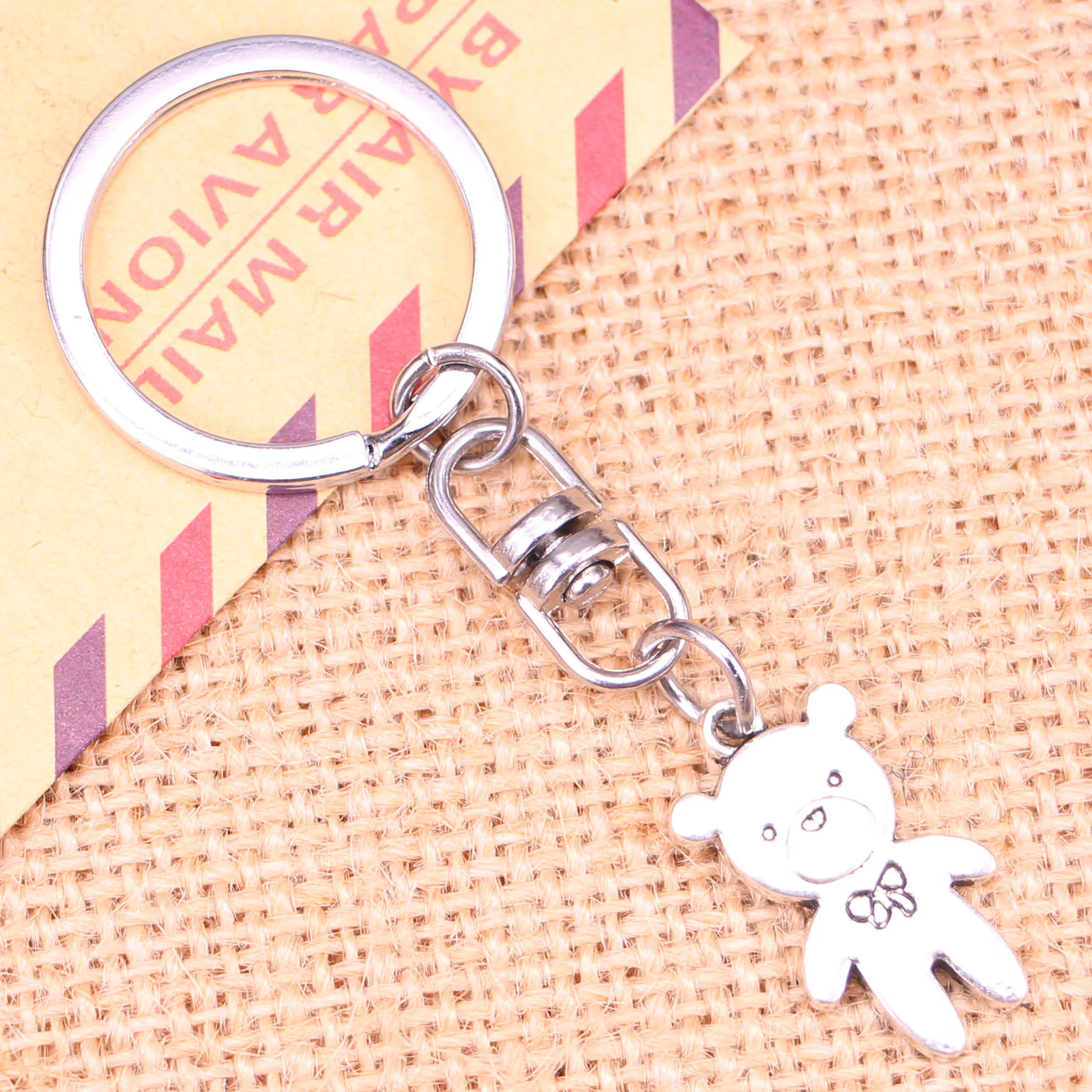 

20pcs New Fashion Keychain 24x14mm bear bow Pendants DIY Men Jewelry Car Key Chain Ring Holder Souvenir For Gift
