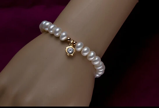 Оригинальные бусины из пресноводного жемчуга имеют скрученные булочки на пару 8-9