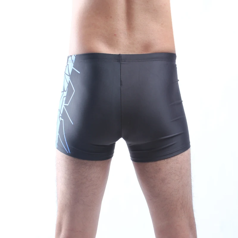 Слева черный правой темно-серый геометрический отпечаток полностью на подкладке Эластичный регулируемый связали отличное качество Купальники для малышек для мужчин