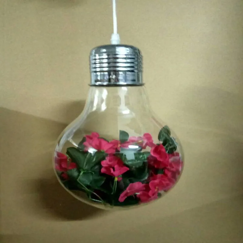 Растение в кофейне с большой лампочкой подвесной светильник из зеленого стекла