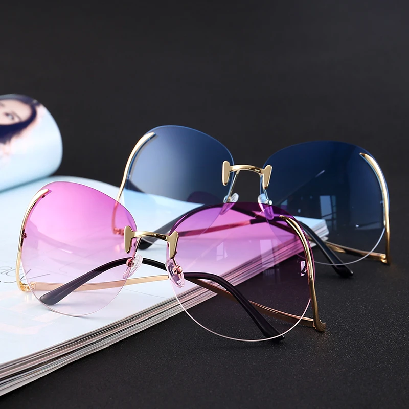 Солнцезащитные очки женские без оправы с прозрачными градиентными изогнутыми