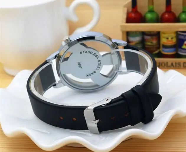 

Exquisite double-sided hollow Music Note Notation Watch Men Women Leather Watches Stainless Steel Case Quartz WristWatch Clock