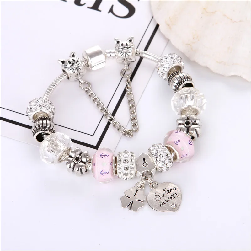 Посеребренные белые кристаллические шарики подвеска в виде сердца и клевера