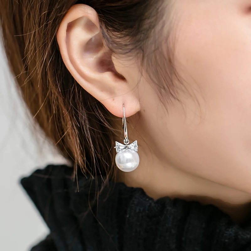 Серьги-капельки из корейского кристалла с бантом и жемчугом циркониевые женские