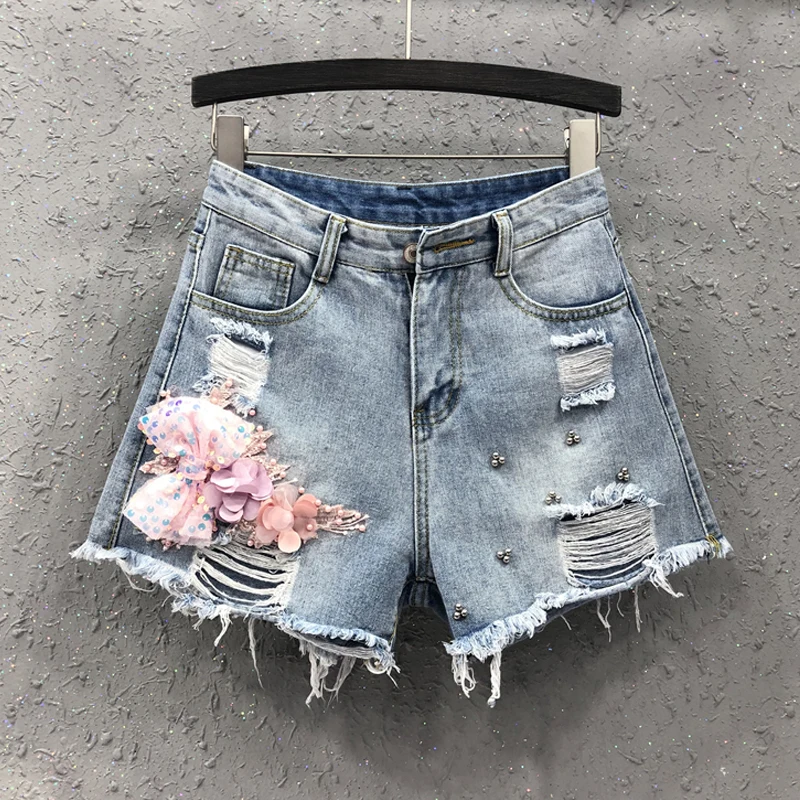 Летние женские синие джинсовые шорты с блестками и цветочным бисером завышенной