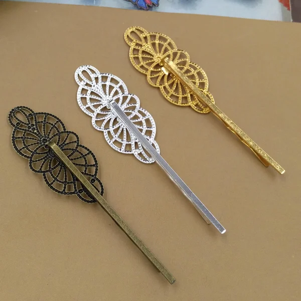 Зажим для волос булавка Бобби с латунной подложкой и цветом старинной бронзы/золота/серебра размером 19*43 мм в стиле ZAKKA с цветочным орнаментом.