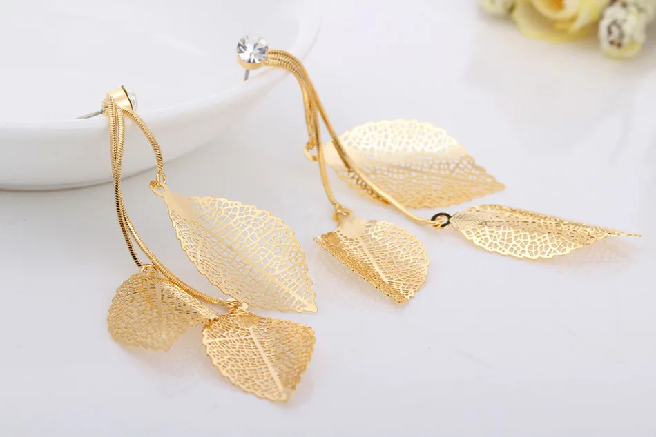 Женские серьги подвески с цепочкой висячие из трех филигранных листьев длинной