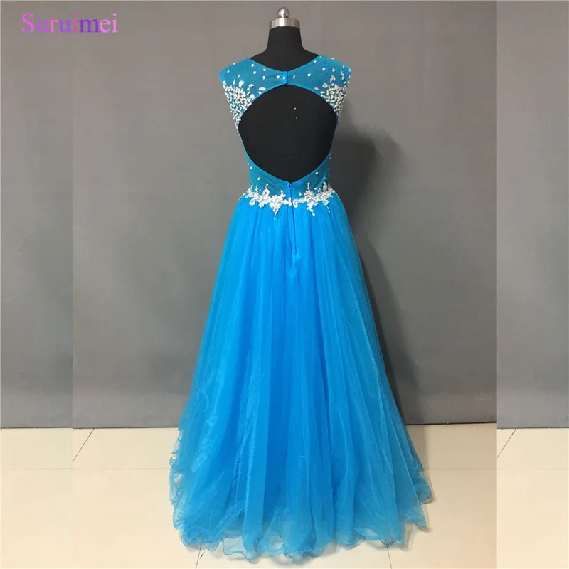 Женское вечернее платье с открытой спиной длинное синее высоким иллюзионным