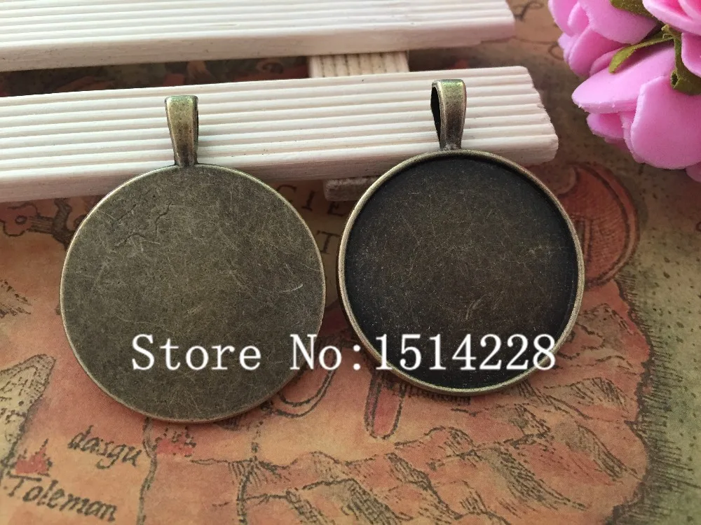 

Free shipping!20pcs/lot.Metal Alloy Round Pendant Cabochon Settings Jewelry Pendant Tray(inner Size 30mm)