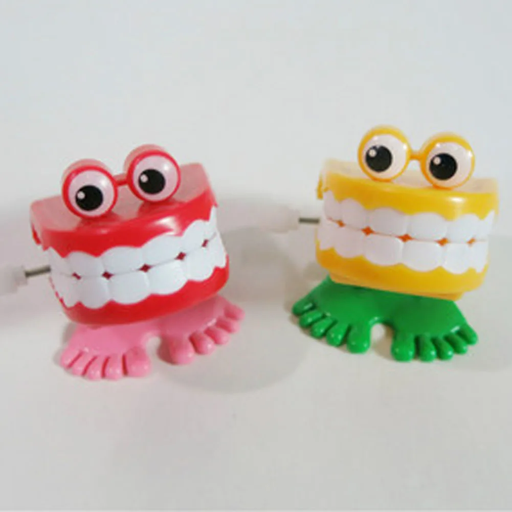 2017 1 шт. игрушки оптом на цепочке прыгнули четыре абзаца стилей зубов случайные
