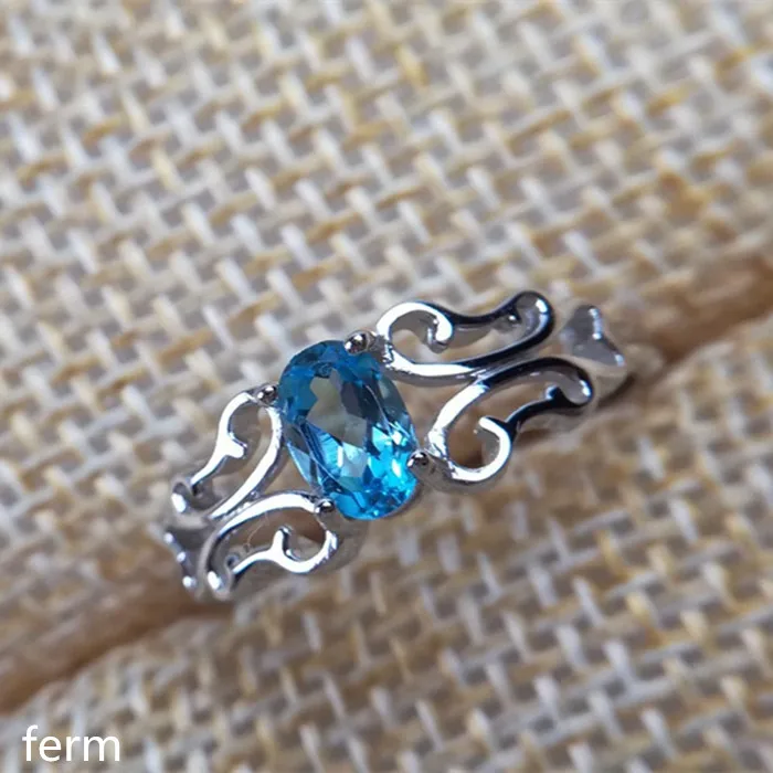 

KJJEAXCMY fine jewelry 925 sterling silver inlaid natural blue topaz ring is smooth and curvy and bold