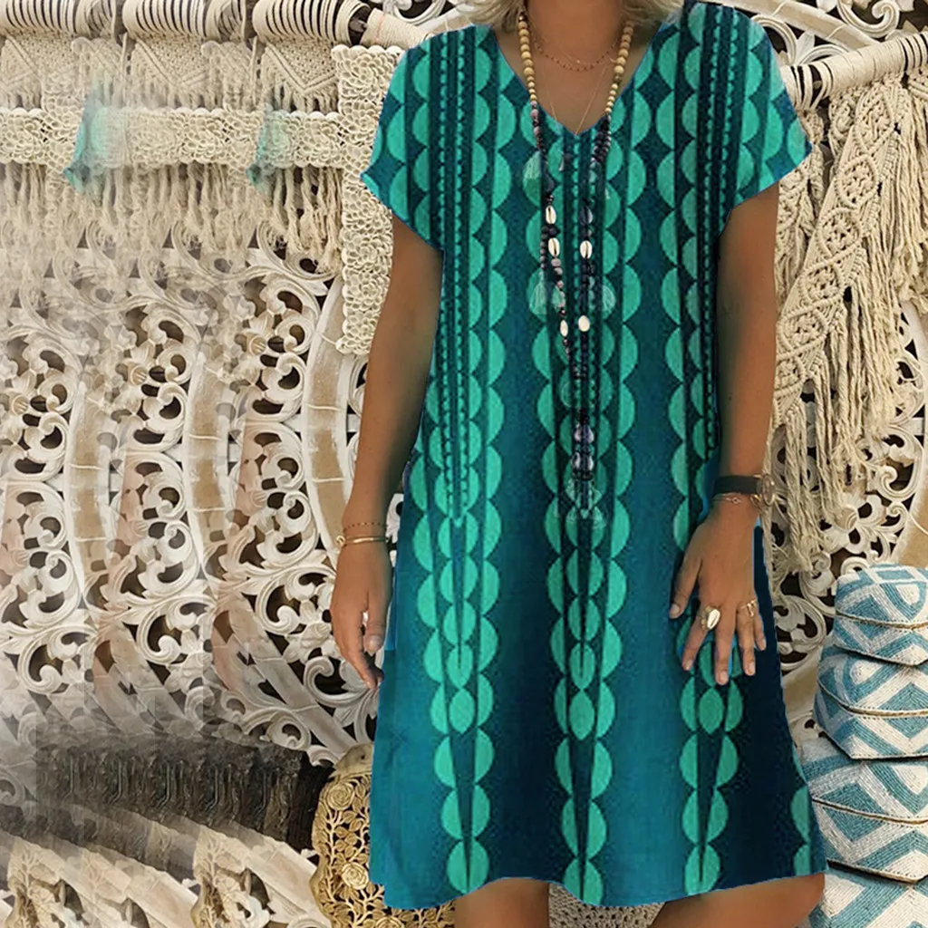 Женское платье со страусом FREE фиолетовое с треугольным вырезом и цветочным