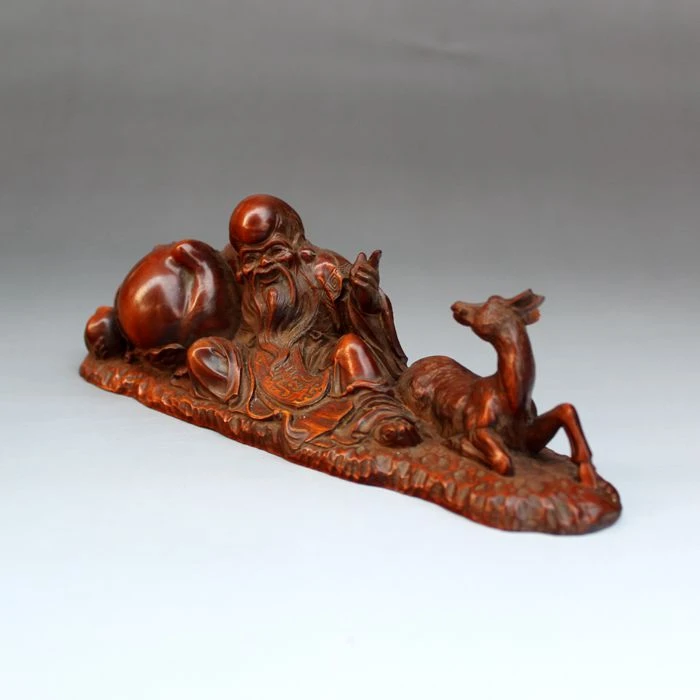 

Boxwood wood carving, longevity old man and deer gain wealth.