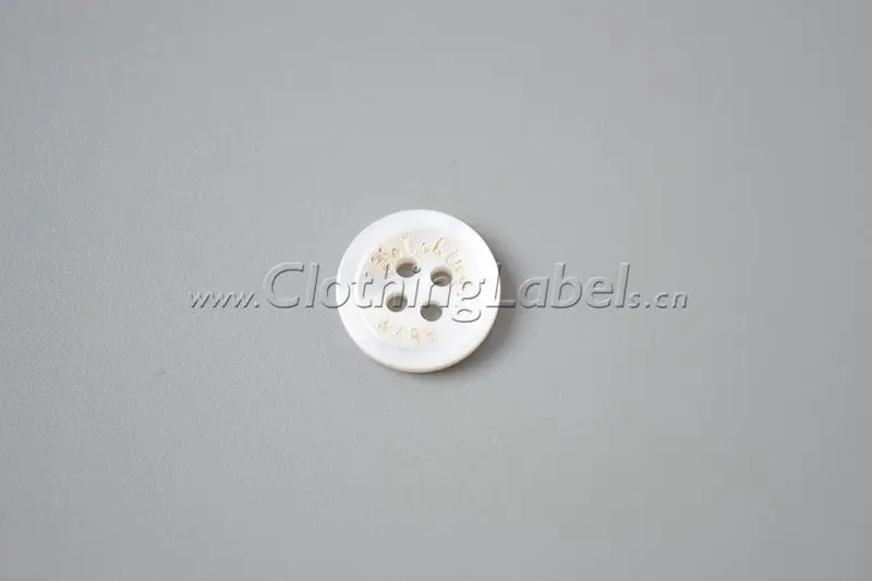 

Custom shell button for clothing, shoes, bags, t-shirts etc., small size, eco-friendly with laser printing of logo