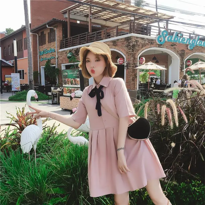 Женское Хлопковое платье поло розовое до колена с воротником и бантом в