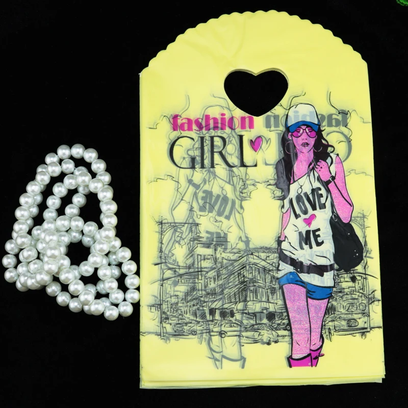 Оптовая продажа 50 шт Желтая пластиковая сумка с принтом для девочек 13x21 см