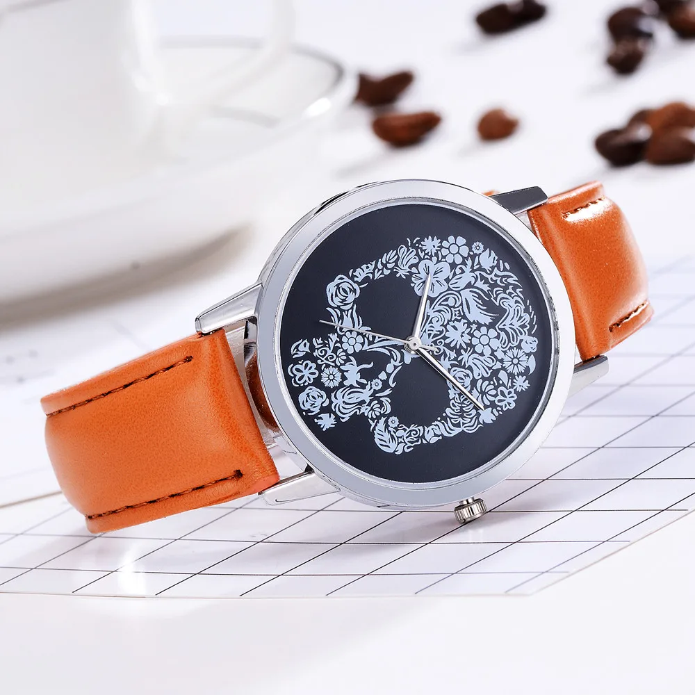 Женские кварцевые часы с черепом и кожаным ремешком серебристого черного цвета |