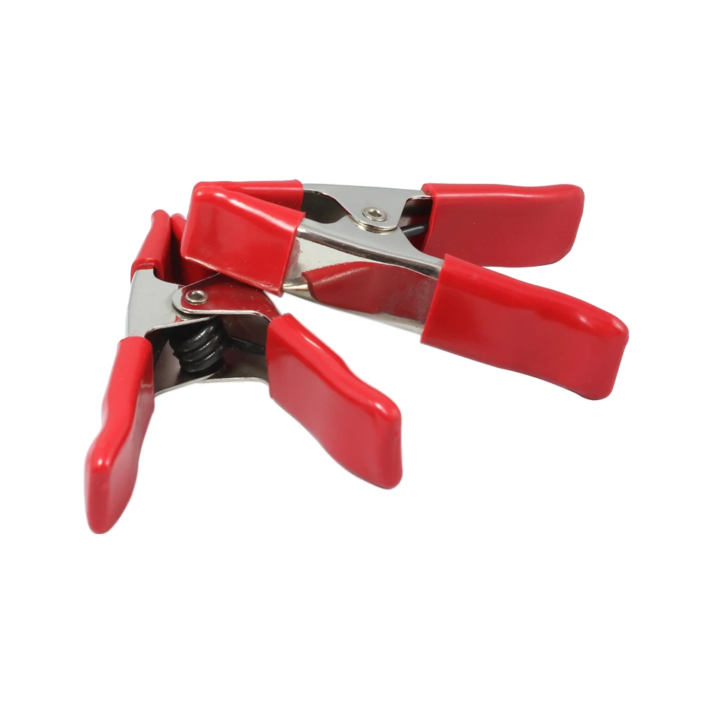 Пружинный зажим для хранения файлов и алмазных камней на направляющих