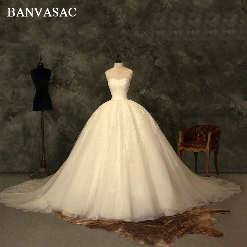 

BANVASAC Ball Gown Wedding Dresses Lace Appliques 2018 Strapless Real Photos Plus Size Embroidery Court Train Bridal Dresses