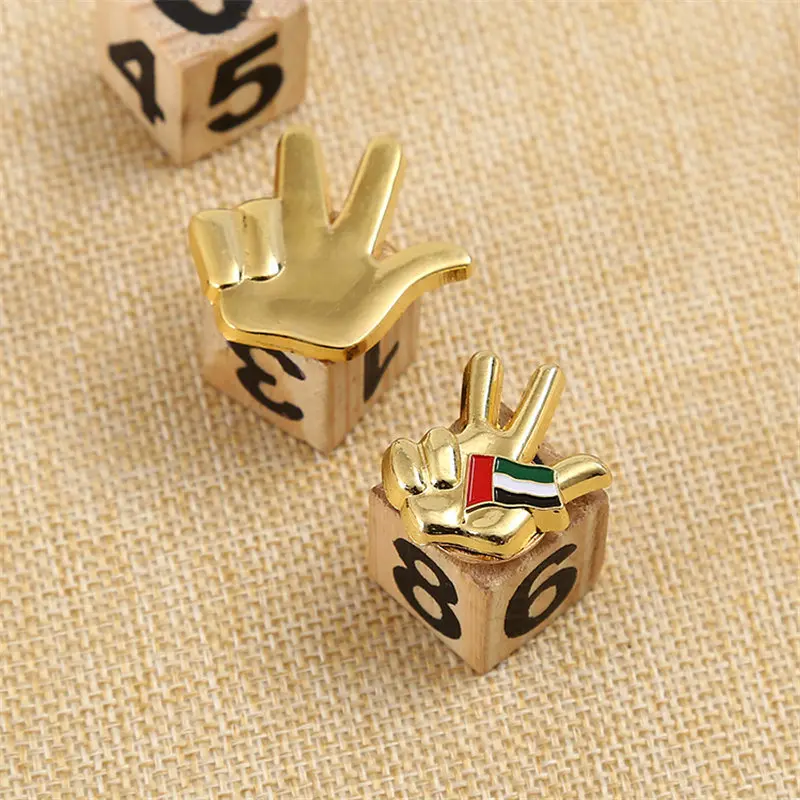 

Custom Plating Gold Badge New Style Hand Metal Badges
