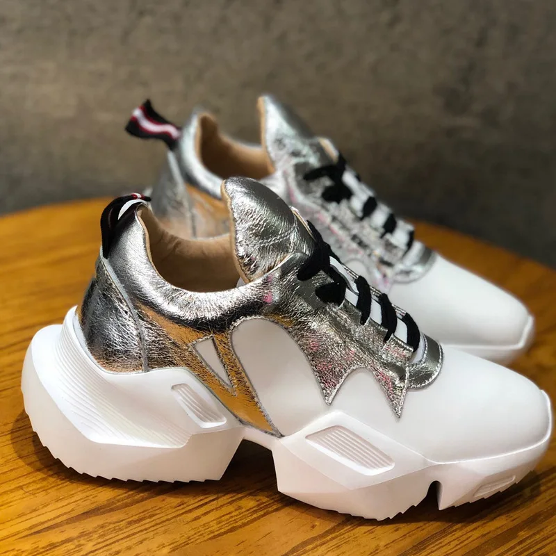 Женские кроссовки из натуральной кожи на платформе с перекрестными ремешками