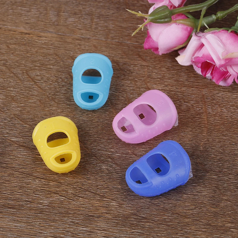 4Pcs/Set For Training Learning Guitar Silicone Finger Guards Fingertip Protectors Ukulele Accessories |