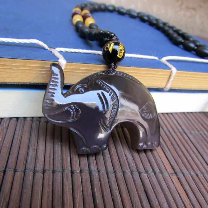 

Natural ice obsidian elephant pendant