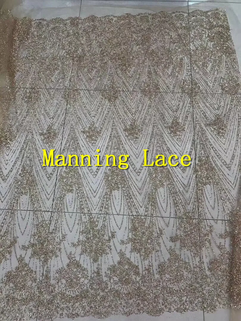

Gold glued glitter Nigerian tulle lace fabric with glued glitter african tulle net lace fabric