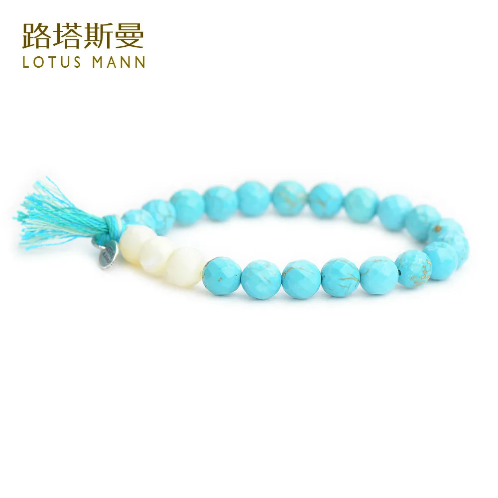 

Lotus Mann 8 mm big section of and white mother bei lap small tassel bracelet