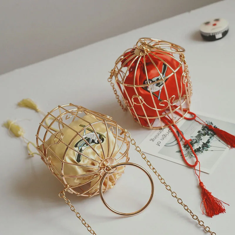 Женская вечерняя сумка клатч TekiEssica в виде птичьей клетки с металлической рамой и