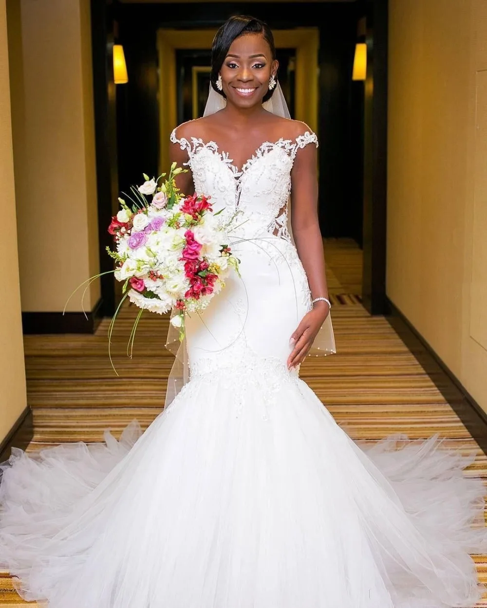 

Shop Sexy Illusion Back Africa Mermaid Wedding Dresses 2020Pure White Cap Sleeve Embroidery Beading Lace Bride Wedding Dress