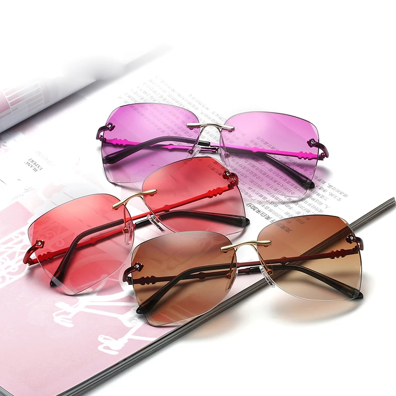

2018 fashion unframed lady's sunglasses will gradually change to the ocean color frame Sun GlassesUV400 with glasses 2668