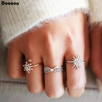 docona luxurious new fashion finger rings sets 3pcssets clear crystal stone hollow sun shape design jewelry for women 6377