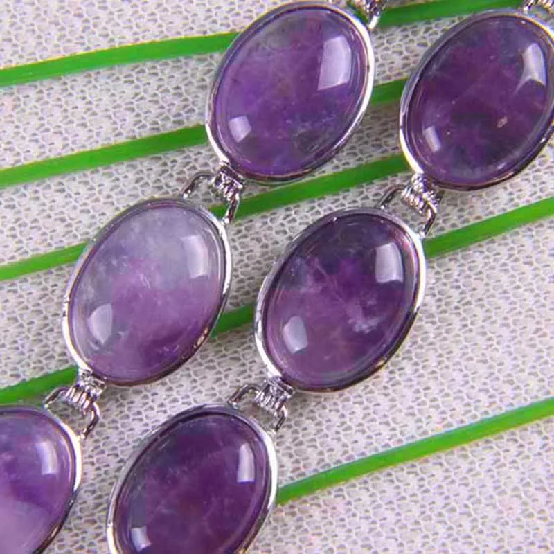 Браслет с фиолетовыми хрустальными бусинами и драгоценным камнем ювелирные