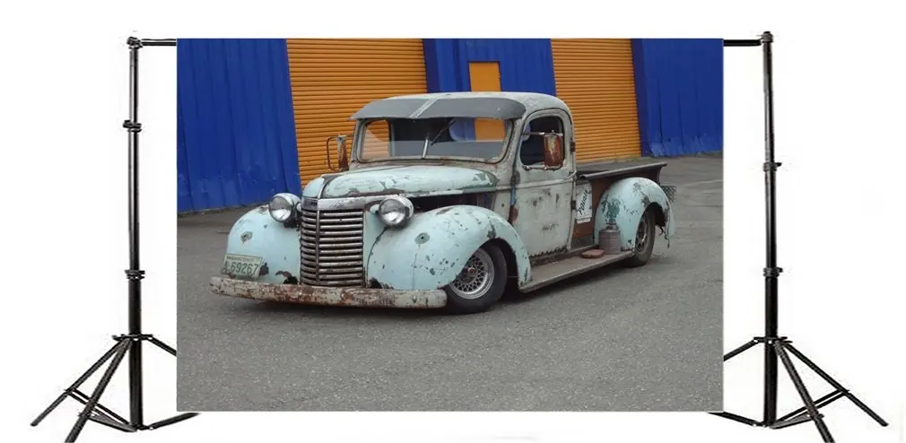 

Фон для фотосъемки с изображением брошенных ржавых винтажных автомобилей